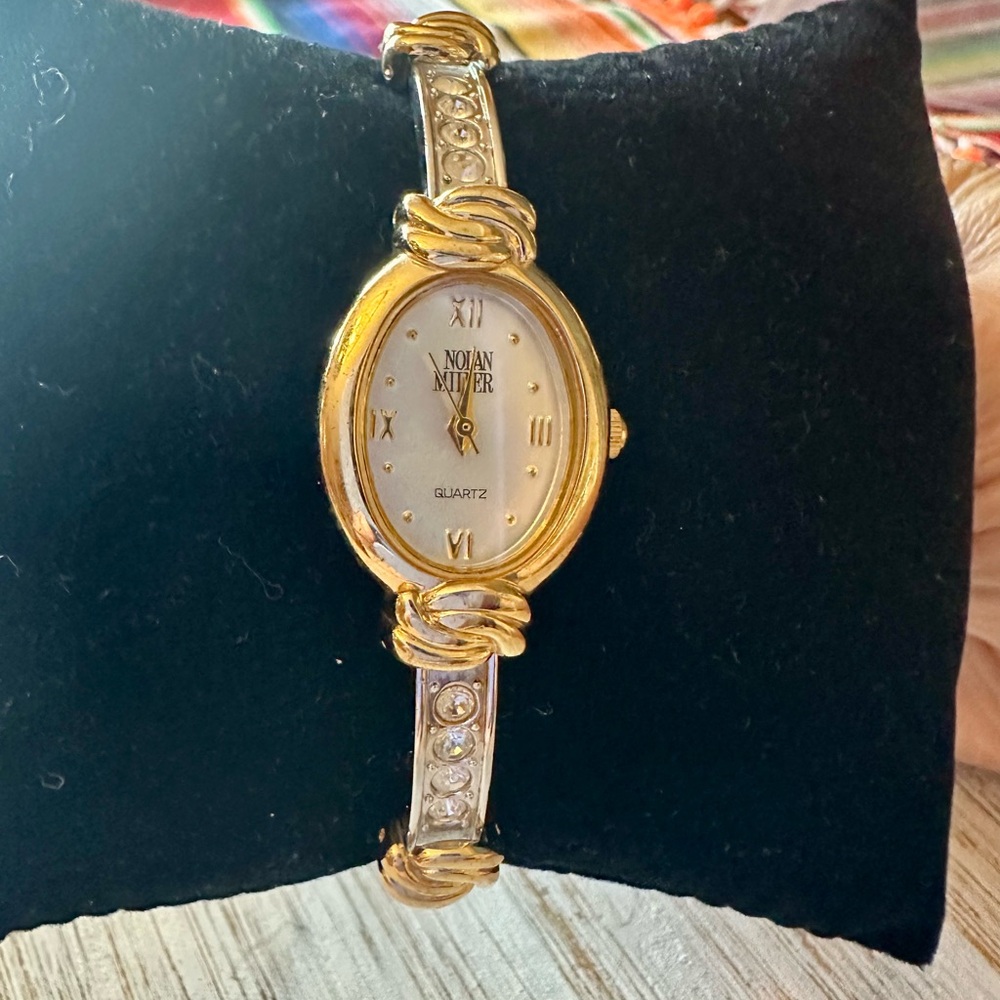 Nolan Miller Gold and Silver Women's Watch